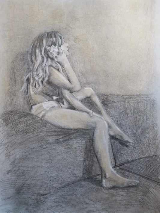Pencil drawing of a person sitting on a couch with a flower in their hair.